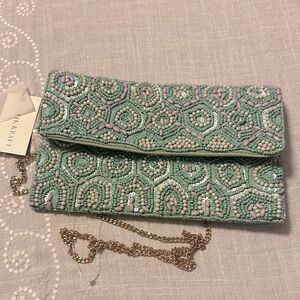 Antik Kraft green and lilac beaded clutch and gold crossbody chain